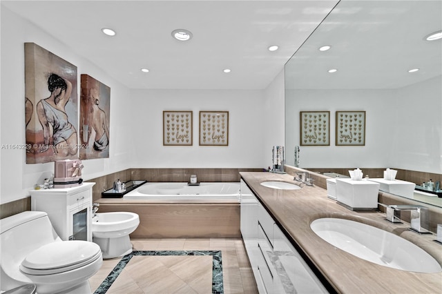 bathroom with toilet, tile patterned flooring, a bidet, a washtub, and vanity