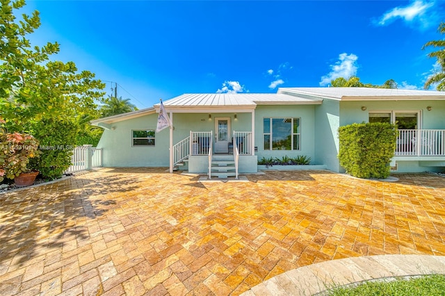 view of front of home featuring a patio area