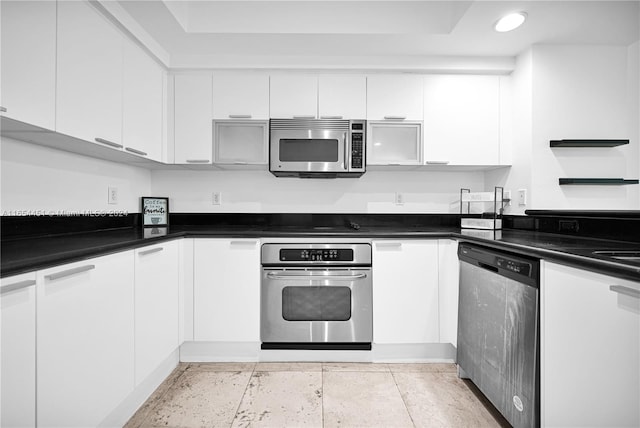 kitchen featuring white cabinetry and stainless steel appliances