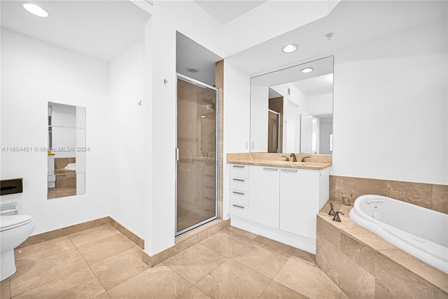 full bathroom with plus walk in shower, tile patterned floors, vanity, and toilet