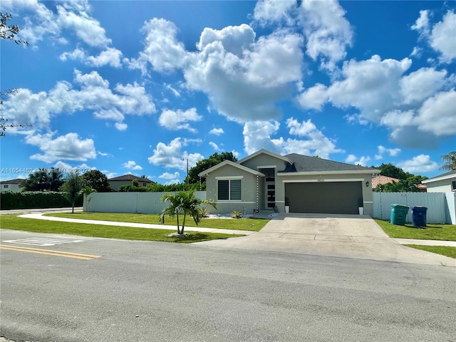 ranch-style home featuring a garage and a front yard