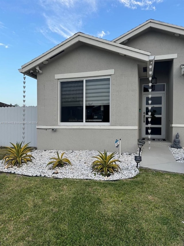 view of property exterior featuring a yard