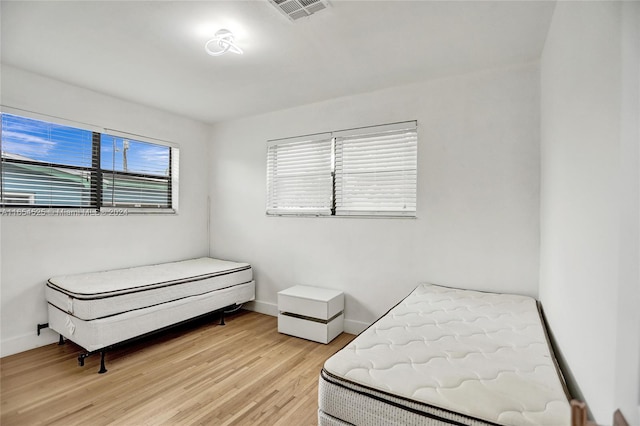 bedroom featuring light hardwood / wood-style floors