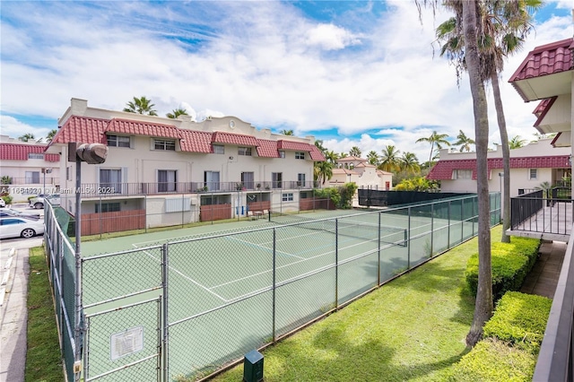 8650 SW 67th Ave Unit 1032, Pinecrest, FL 33156 - view of tennis court featuring a residential view