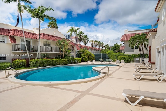 view of pool with a patio area