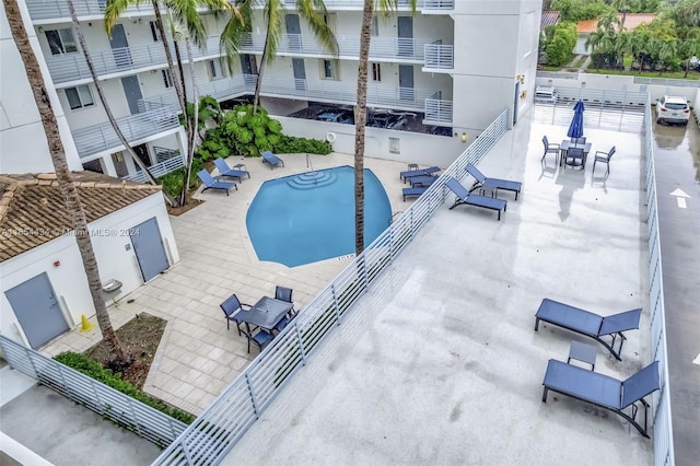 view of swimming pool featuring a patio