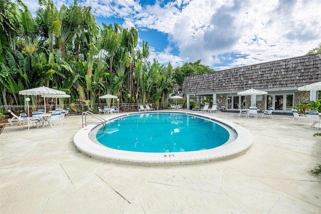 view of pool with a patio