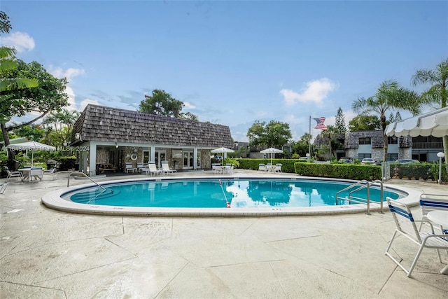 view of pool featuring a patio area