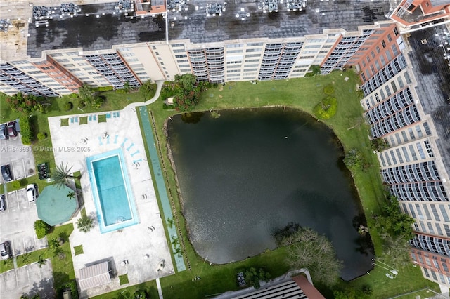 bird's eye view featuring a view of city and a water view