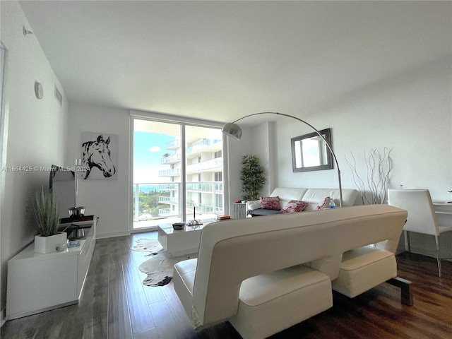 bedroom with dark hardwood / wood-style flooring