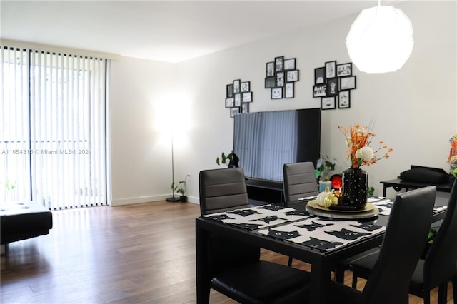 dining area featuring hardwood / wood-style floors