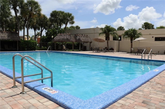 view of swimming pool featuring a patio