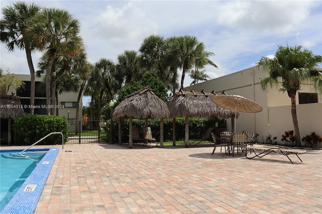 view of swimming pool featuring a patio area and a gazebo