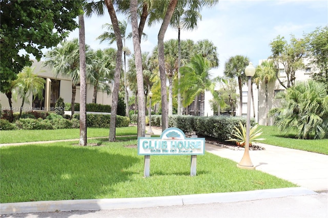 view of home's community featuring a yard