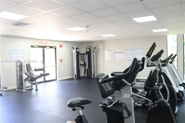 workout area with a drop ceiling