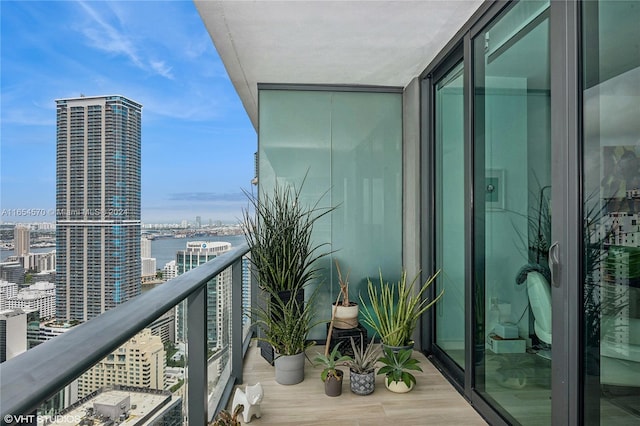 balcony featuring a water view