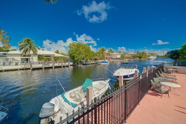 view of dock with a water view