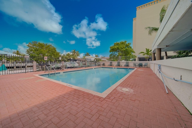 view of pool featuring a patio