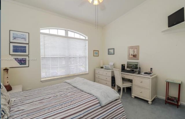 bedroom with crown molding, ceiling fan, vaulted ceiling, and carpet