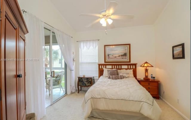 carpeted bedroom featuring ceiling fan and access to outside