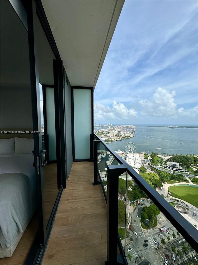 balcony featuring a water view