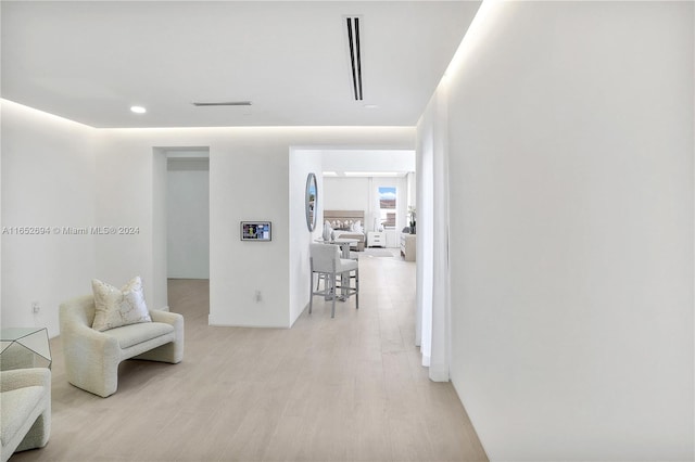 hall featuring light hardwood / wood-style flooring