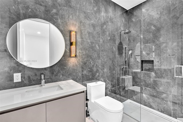 bathroom featuring toilet, tiled shower, decorative backsplash, vanity, and tile walls