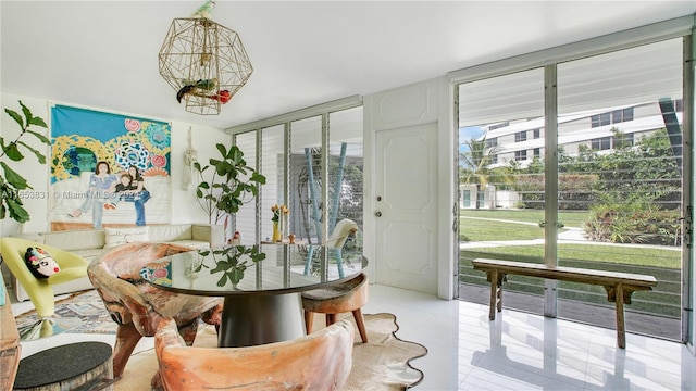 dining room with light tile patterned floors and floor to ceiling windows