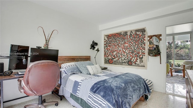 bedroom featuring speckled floor