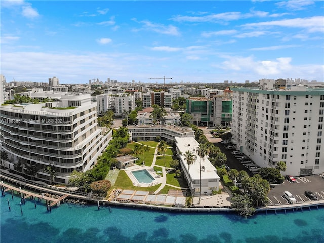 aerial view featuring a city view and a water view