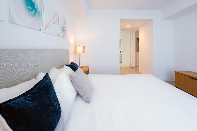 bedroom with light hardwood / wood-style floors