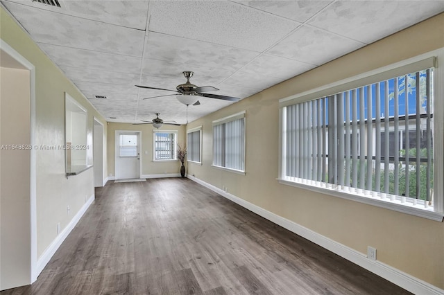 spare room featuring ceiling fan and wood-type flooring