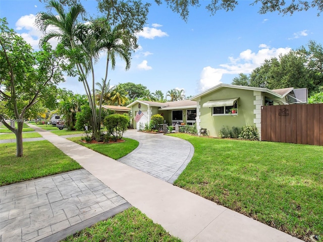 ranch-style house with a front yard