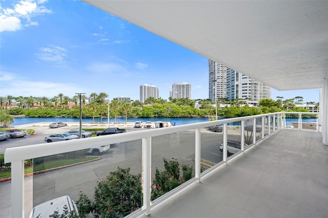 balcony featuring a water view