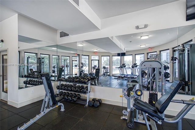 20505 E Country Club Dr Unit 231, Aventura, FL 33180 - workout area featuring visible vents and baseboards
