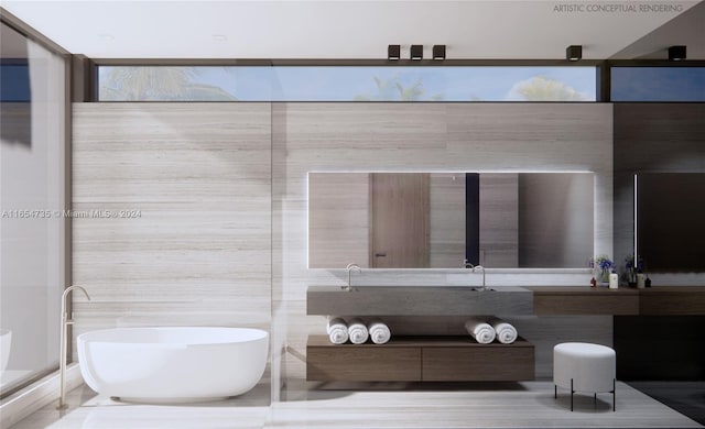 bathroom with vanity and a tub