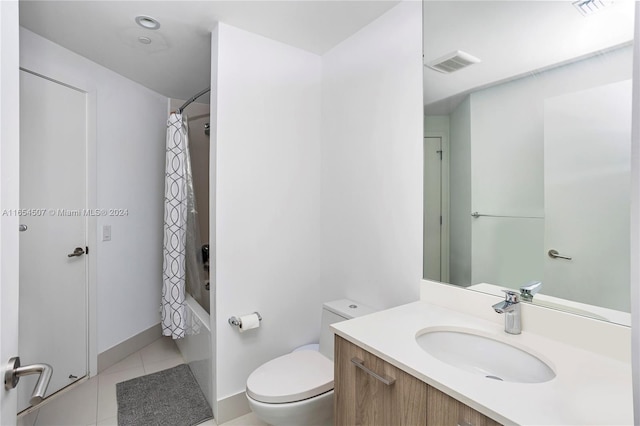 full bathroom with vanity, toilet, shower / bath combination with curtain, and tile patterned floors