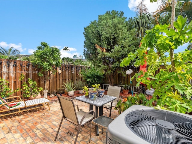 view of patio / terrace with central AC unit