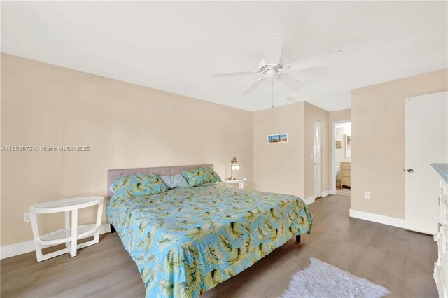 bedroom featuring ceiling fan and hardwood / wood-style flooring