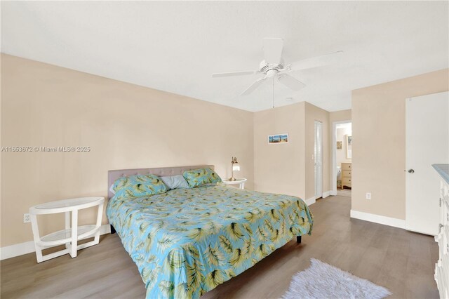 1516 S Lakeside Dr Unit 112, Lake Worth, FL 33460 - bedroom with wood finished floors and ceiling fan