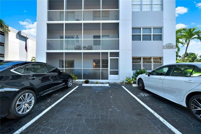 1516 S Lakeside Dr Unit 112, Lake Worth, FL 33460 - view of property featuring uncovered parking