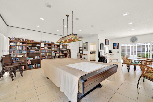 game room featuring light tile patterned floors