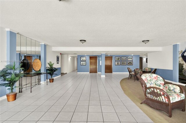 1516 S Lakeside Dr Unit 112, Lake Worth, FL 33460 - building lobby featuring a textured ceiling