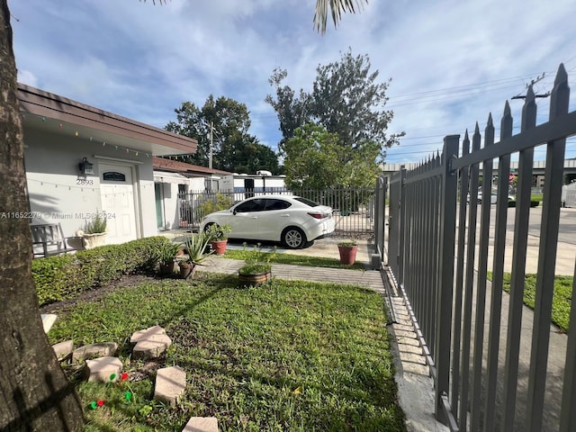 view of yard featuring a garage