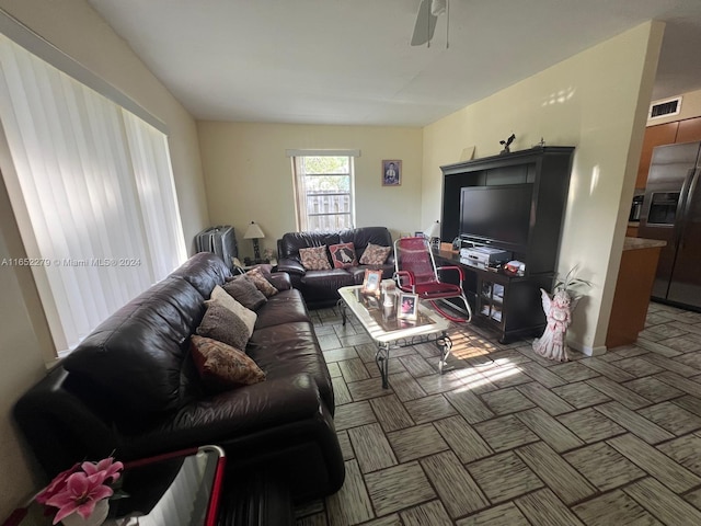 living room with ceiling fan