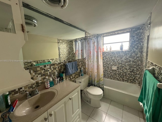 full bathroom with toilet, tile patterned flooring, vanity, shower / bathtub combination with curtain, and decorative backsplash