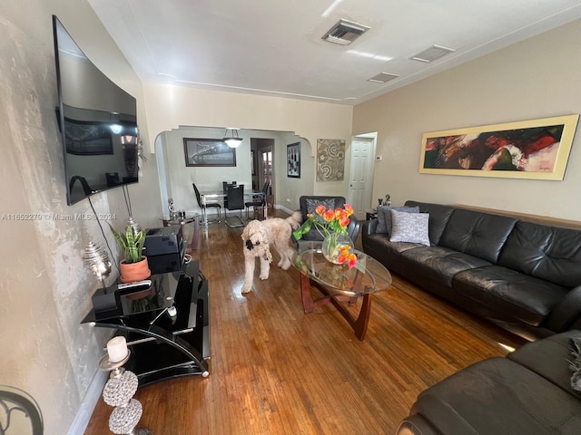 living room with hardwood / wood-style flooring