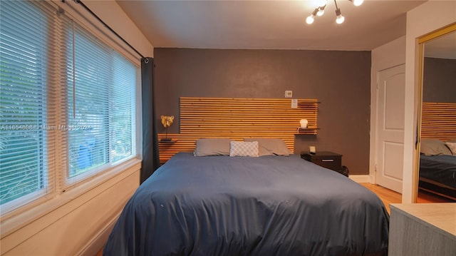 bedroom with light wood-type flooring