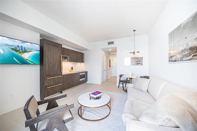 living room with light tile patterned floors