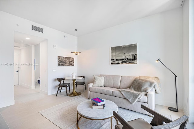 living room with light tile patterned floors